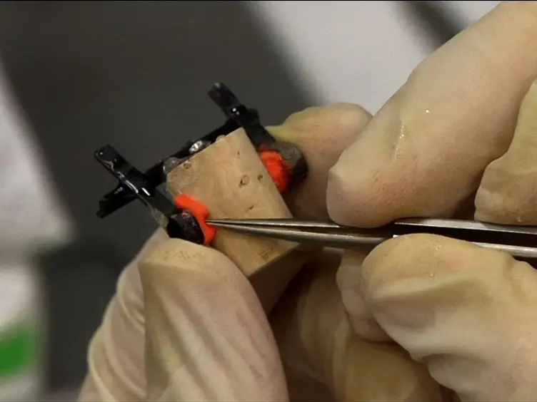 A Lightweight, Headphones-based System for Manipulating Auditory Feedback in Songbirds