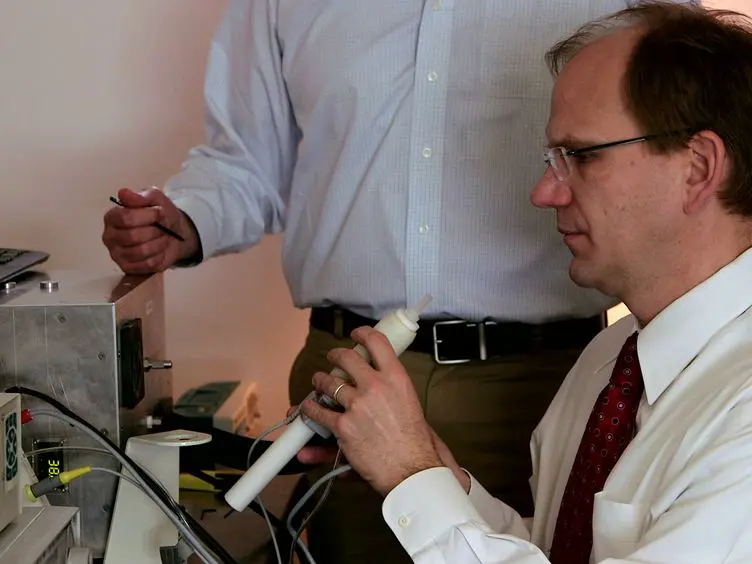 Fast and Accurate Exhaled Breath Ammonia Measurement