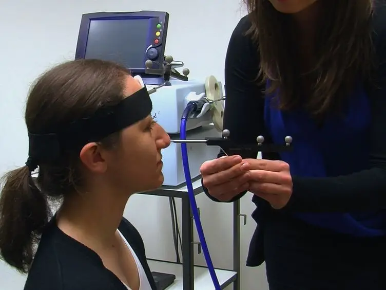 Transcranial Magnetic Stimulation for Investigating Causal Brain-behavioral Relationships and their Time Course