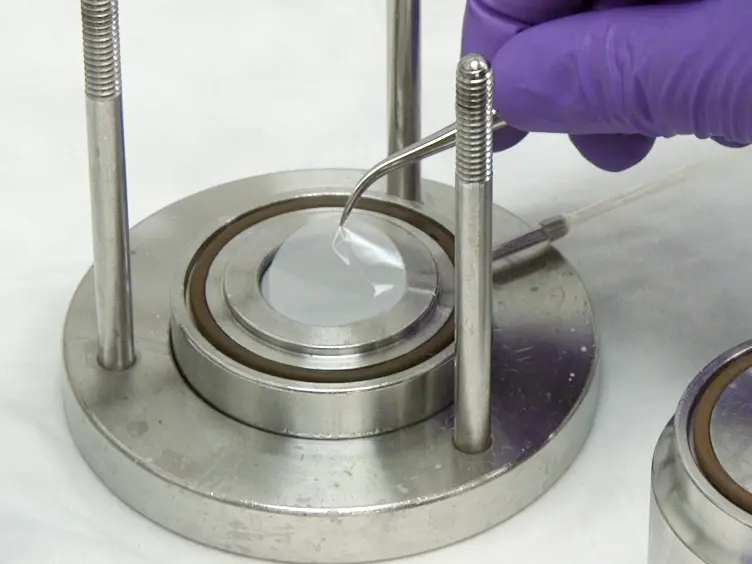 Custom-designed Laser-based Heating Apparatus for Triggered Release of Cisplatin from Thermosensitive Liposomes with Magnetic Resonance Image Guidance