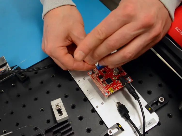 Automation of Mode Locking in a Nonlinear Polarization Rotation Fiber Laser through Output Polarization Measurements