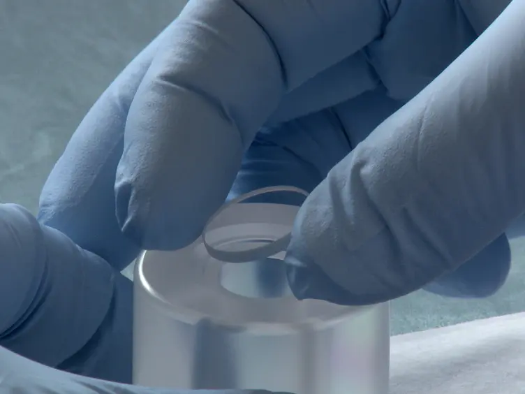 A Novel Technique for Raman Analysis of Highly Radioactive Samples Using Any Standard Micro-Raman Spectrometer