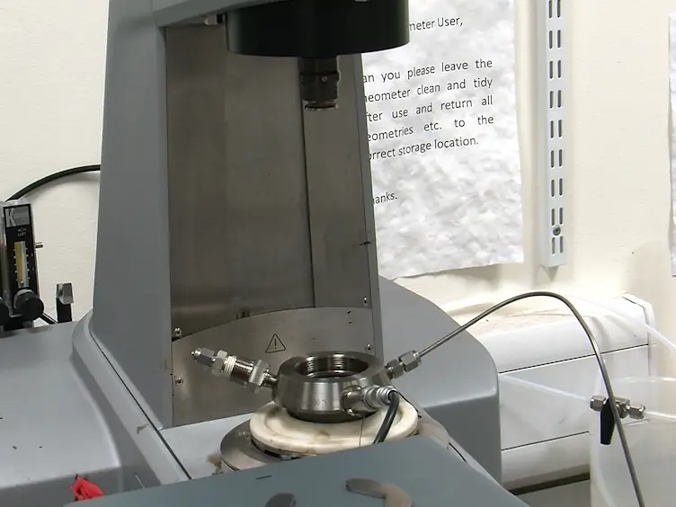 Measurement of the Rheology of Crude Oil in Equilibrium with CO<sub>2</sub> at Reservoir Conditions