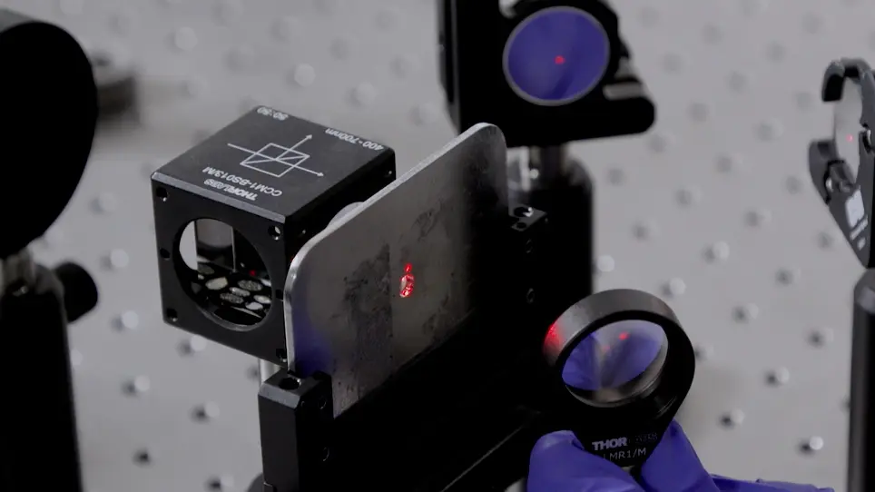 Demonstration of Spin-Multiplexed and Direction-Multiplexed All-Dielectric Visible Metaholograms