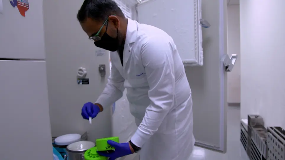 Cryogenic Sample Loading into a Magic Angle Spinning Nuclear Magnetic Resonance Spectrometer that Preserves Cellular Viability