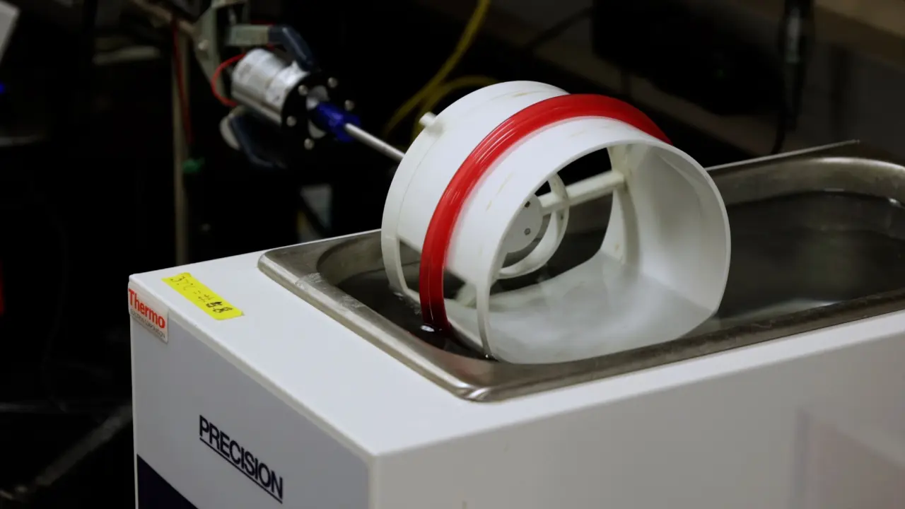 Tracking Fibrinolysis of Chandler Loop-Formed Whole Blood Clots Under Shear Flow in An In-Vitro Thrombolysis Model